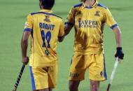 ranjit-singh-in-yellow-in-celebrating-3rd-goal-for-jpw-during-3rd-place-match-of-hhil2013-at-ranchi-1
