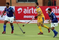 v-raghunath-left-side-in-action-during-3rd-place-match-of-hhil2013-at-ranchi