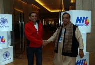 Dr. Narinder Batra, Secretary General Hockey India and Chairman Hockey India League with Amit Burman, owner Mumbai Magicians