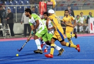 Rupinder Pal Singh of DWR in action against JPW