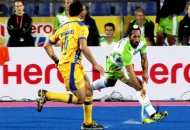 Sardar Singh captain of DWR and Jamie Dwyer captain of JPW in action in the match