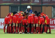 team-huddle-of-ranchi-rhinos-during-17-match-of-hhil-2013-at-ranchi-hockey-stadium