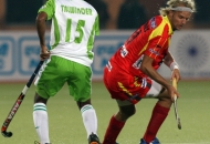 floris-evers-in-red-jersey-in-action-during-11-match-of-hhil2013-at-ranchi-hickey-stadium