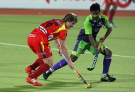 ranchi-rhinos-players-in-red-jersey-and-delhi-wave-rider-players-in-green-in-action-during-22nd-match-of-hhil2013-at-astroturf-hockey-stadium-ranchi-3