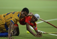 mandeep-singh-in-red-and-gurinder-singh-in-yellow-in-action-match-no-24-of-hhil2013-at-ranchi-1