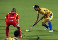 sukhdev-singh-in-yellow-in-action-match-no-24-of-hhil2013-at-ranchi