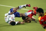 captain-of-up-wizard-in-whit-with-kothajit-singh-in-red-in-action-during-12-th-match-of-hhil2013-at-ranchi