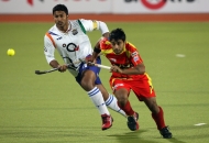 ranchi-rhinos-players-and-uttar-pradesh-wizard-team-players-in-action-during-12th-match-of-hhil-2013-at-astroturf-stadium-ranchi-on-date-24-jan-2013-3