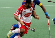 satbir-singh-of-dmm-in-white-in-action-along-with-upw-skipper-raghunath-during-the-match