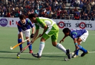 delhi-waveriders-and-up-wizards-in-action-during-their-match-at-lucknow-on-19th-jan-2013-4