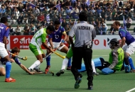 raghunath-captain-of-up-wizards-scoring-a-first-goal-for-up-wizards-against-delhi-waveriders-at-lucknow-on-19th-jan-2013-2