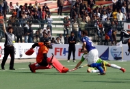up-wizards-trying-to-hit-a-goal-against-delhi-waveriders-at-lucknow-on-19th-jan-2013